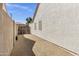 Gated side yard featuring low-maintenance landscaping with a crushed gravel ground cover at 5046 W Monte Cristo Ave, Glendale, AZ 85306