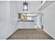 Open living room area with neutral walls and views of kitchen at 537 S Delaware Dr # 224, Apache Junction, AZ 85120