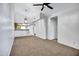 Spacious living room with modern ceiling fan and easy access to the kitchen at 537 S Delaware Dr # 224, Apache Junction, AZ 85120