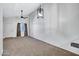 Cozy living area featuring a ceiling fan and a window with curtains at 537 S Delaware Dr # 224, Apache Junction, AZ 85120