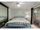 Bright bedroom with a large mirror, sliding glass door, and neutral carpet at 6207 N 21St Dr, Phoenix, AZ 85015