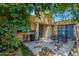 Cozy outdoor patio area, perfect for relaxation, featuring ample space and a wrought iron patio set at 6207 N 21St Dr, Phoenix, AZ 85015