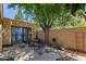 Private patio area with plenty of room to entertain guests or enjoy the shade under mature trees at 6207 N 21St Dr, Phoenix, AZ 85015