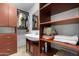 Ensuite bathroom featuring updated vanity with bowl sink and custom cabinetry storage at 654 W Plata Ave, Mesa, AZ 85210