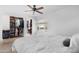 Bright bedroom with walk-in closet and a view of the backyard and pool at 654 W Plata Ave, Mesa, AZ 85210