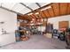 Large garage interior offering substantial storage and workspace, perfect for various projects and hobbies at 654 W Plata Ave, Mesa, AZ 85210