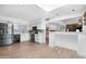 Modern kitchen with stainless steel appliances, sleek countertops, and ample cabinet space at 654 W Plata Ave, Mesa, AZ 85210