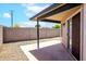 Private back patio is the perfect spot for outdoor lounging and relaxing in a tranquil setting at 7045 S 42Nd St, Phoenix, AZ 85042