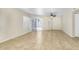 Spacious living room boasting tile flooring, abundant natural light, and neutral walls for versatile décor options at 7045 S 42Nd St, Phoenix, AZ 85042