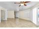 Living room features tile flooring, neutral walls, and natural light, creating an inviting atmosphere at 7045 S 42Nd St, Phoenix, AZ 85042
