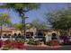 The Peak shopping center includes local shops with well-maintained landscaping at 7464 E Paraiso Dr, Scottsdale, AZ 85255