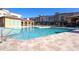 Beautiful community pool with inviting lounge area and modern design at 7464 E Paraiso Dr, Scottsdale, AZ 85255