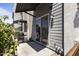 Back patio with a gas grill, a privacy fence, and a sliding glass door to the interior at 7531 E Billings St # 116, Mesa, AZ 85207