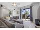 Comfortable living room with sliding glass doors to patio that allow lots of natural light at 7531 E Billings St # 116, Mesa, AZ 85207