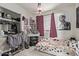 Bedroom with a bed, closet, and decorative accents at 8111 E Jerome Ave, Mesa, AZ 85209