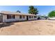 Inviting single-story home showcasing a drought tolerant yard and classic design at 8111 E Jerome Ave, Mesa, AZ 85209