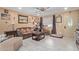 Cozy living room featuring a ceiling fan, neutral walls, and decorative accents at 8111 E Jerome Ave, Mesa, AZ 85209