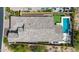 Expansive shot featuring a home with a pool, putting green, patio, and detailed roof, set amongst desert landscaping at 9059 E Leonora St. St, Mesa, AZ 85207