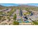 Aerial view of upscale neighborhood featuring meticulously landscaped homes and resort-style amenities at 9059 E Leonora St. St, Mesa, AZ 85207