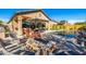 This backyard features a pool, a fire pit and an outdoor seating area at 9059 E Leonora St. St, Mesa, AZ 85207