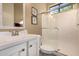 Bright bathroom featuring modern fixtures, a glass-enclosed shower, and clean lines for a contemporary feel at 9059 E Leonora St. St, Mesa, AZ 85207