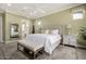 Spacious bedroom with large windows, neutral tones, and stylish decor for a bright, open feel at 9059 E Leonora St. St, Mesa, AZ 85207
