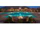 Resort-style community pool featuring fountains and a grand clubhouse with mountain views in the background at 9059 E Leonora St. St, Mesa, AZ 85207