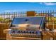 Close up of a top-of-the-line outdoor gas grill perfect for summer barbecues and outdoor cooking at 9059 E Leonora St. St, Mesa, AZ 85207
