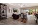 Stylish living room with tile floors, comfortable seating, ceiling fan and outdoor patio access at 9059 E Leonora St. St, Mesa, AZ 85207