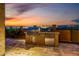 Well-equipped outdoor kitchen with stainless steel grill and appliances ideal for entertaining guests at 9059 E Leonora St. St, Mesa, AZ 85207