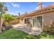 Spacious backyard with block wall, patio and low maintenance artificial turf at 9223 E Camino Del Santo --, Scottsdale, AZ 85260