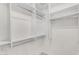 Custom walk-in closet with ample shelving and hanging storage at 9223 E Camino Del Santo --, Scottsdale, AZ 85260