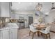 Bright kitchen features gray cabinets, stainless steel appliances and a breakfast nook at 9223 E Camino Del Santo --, Scottsdale, AZ 85260