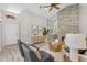 Open living area with stone fireplace and neutral paint and decor at 9223 E Camino Del Santo --, Scottsdale, AZ 85260