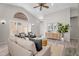 Bright living room features vaulted ceilings and neutral furniture with accent pieces at 9223 E Camino Del Santo --, Scottsdale, AZ 85260