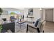 Cozy living room featuring neutral colors, modern furnishings, and bright natural light at 9707 W Lancaster Dr, Sun City, AZ 85351