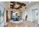 Dining room features a chandelier, a round table with six chairs, and hardwood floors at 9820 E Thompson Peak Pkwy # 628, Scottsdale, AZ 85255