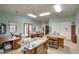 Light-filled flexible room with ample space, work tables, and shelving, perfect for a hobby room or home office at 9820 E Thompson Peak Pkwy # 628, Scottsdale, AZ 85255