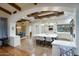 Open-concept kitchen with a large island, ample seating, and view of the dining area at 9820 E Thompson Peak Pkwy # 628, Scottsdale, AZ 85255