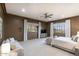 Spacious main bedroom showcasing a sitting area, soft lighting, and stylish decor at 9820 E Thompson Peak Pkwy # 628, Scottsdale, AZ 85255