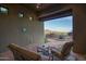 Inviting outdoor patio with comfortable seating and picturesque views of the desert landscape at 9820 E Thompson Peak Pkwy # 628, Scottsdale, AZ 85255