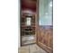 Custom wine cellar features racks for bottles and a mirror at 9820 E Thompson Peak Pkwy # 628, Scottsdale, AZ 85255
