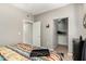 Bedroom with neutral walls and built-in storage provides organized space for easy living at 10030 W Indian School Rd # 165, Phoenix, AZ 85037