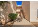 Condo exterior with a stairway and greenery at 10030 W Indian School Rd # 165, Phoenix, AZ 85037