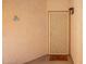 A quaint front door welcomes you with a 'Hello Sunshine' mat at 10030 W Indian School Rd # 165, Phoenix, AZ 85037
