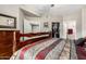 Spacious main bedroom with an ensuite bath and large closet provides a private retreat at 10030 W Indian School Rd # 165, Phoenix, AZ 85037
