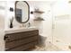 Modern bathroom with glass-enclosed shower and stylish fixtures at 10795 E Sutherland Way, Scottsdale, AZ 85262