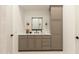 Bathroom featuring a vanity with storage and modern fixtures at 10795 E Sutherland Way, Scottsdale, AZ 85262