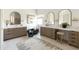 This stylish bathroom includes a double vanity, soaking tub, neutral color palette, and lots of counter space at 10795 E Sutherland Way, Scottsdale, AZ 85262