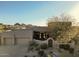 Contemporary home with desert landscaping, three car garage and mountain views at 10795 E Sutherland Way, Scottsdale, AZ 85262